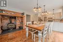 1225 Graham Road, Gravenhurst, ON  - Indoor Photo Showing Dining Room With Fireplace 