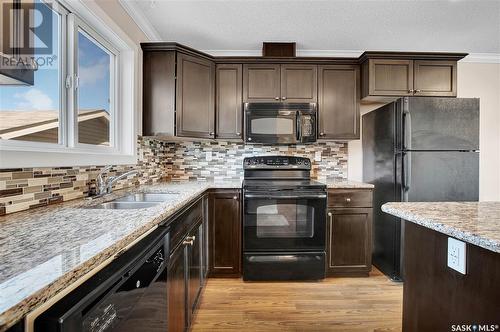 105 315 Hampton Circle, Saskatoon, SK - Indoor Photo Showing Kitchen With Double Sink