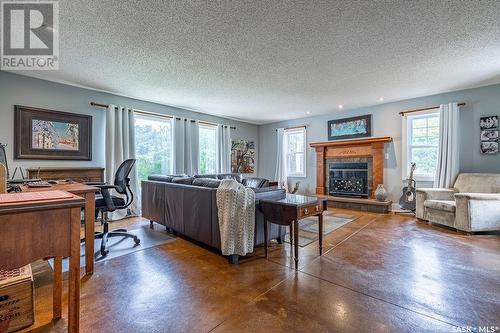 Winds Edge Farm, Corman Park Rm No. 344, SK - Indoor Photo Showing Living Room With Fireplace