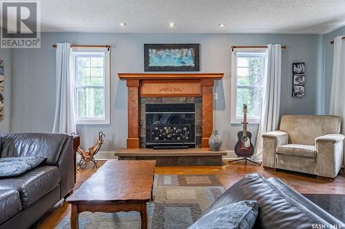 Winds Edge Farm, Corman Park Rm No. 344, SK - Indoor Photo Showing Living Room With Fireplace