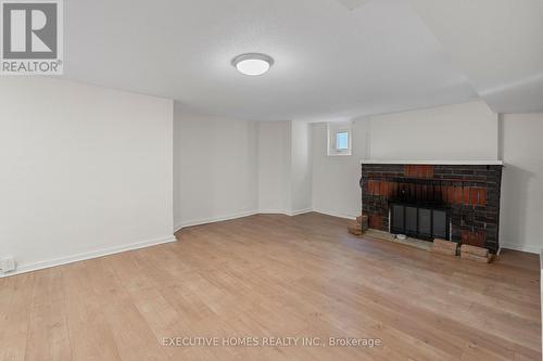 17 Crestland Avenue, Toronto (Danforth Village-East York), ON - Indoor Photo Showing Other Room With Fireplace