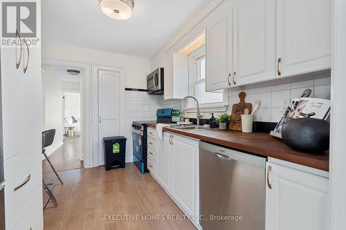 17 Crestland Avenue, Toronto, ON - Indoor Photo Showing Kitchen With Double Sink