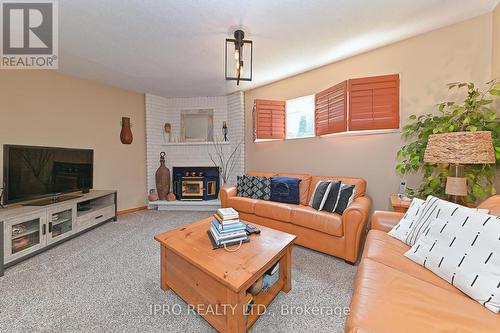16 Bryant Court, Brampton, ON - Indoor Photo Showing Living Room With Fireplace