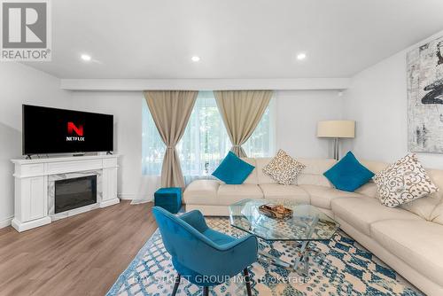 96 Bryant Road, Ajax (South East), ON - Indoor Photo Showing Living Room With Fireplace