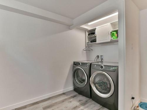 Salle de lavage - 141 Rue Pierrot E., L'Assomption, QC - Indoor Photo Showing Laundry Room