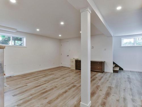 Family room - 141 Rue Pierrot E., L'Assomption, QC - Indoor Photo Showing Basement