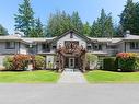 203-440 Schley Pl, Qualicum Beach, BC  - Outdoor With Facade 