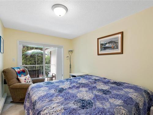 203-440 Schley Pl, Qualicum Beach, BC - Indoor Photo Showing Bedroom