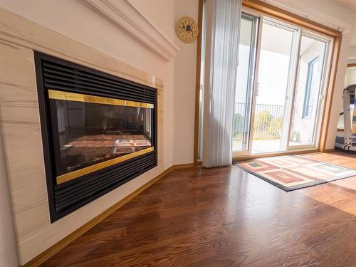 1300 - 203 Huron Street, Keewatin, ON - Indoor With Fireplace