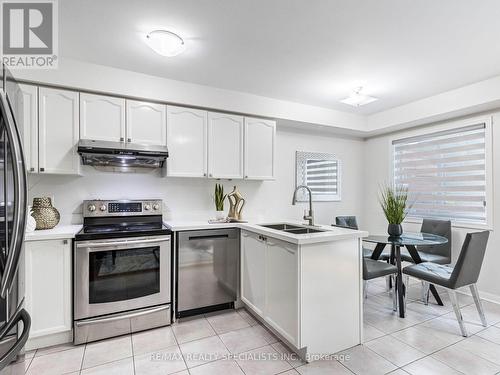 67 Weather Vane Lane, Brampton, ON - Indoor Photo Showing Kitchen With Stainless Steel Kitchen With Double Sink