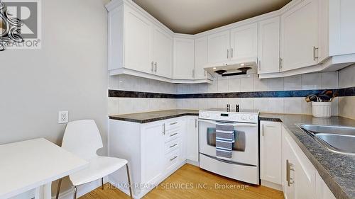 8 Grenadier Road, Brampton, ON - Indoor Photo Showing Kitchen With Double Sink