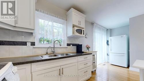 8 Grenadier Road, Brampton, ON - Indoor Photo Showing Kitchen With Double Sink