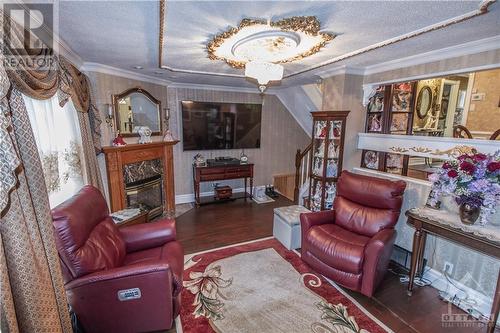 16 Larkshire Lane Unit#B, Ottawa, ON - Indoor Photo Showing Living Room With Fireplace