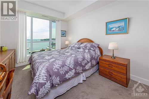 Watch the boats go by from bed! - 129A South Street Unit#210, Gananoque, ON - Indoor Photo Showing Bedroom