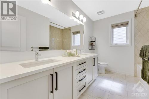 Top level vanity countertops with double sinks - 772 Cappamore Drive, Ottawa, ON - Indoor Photo Showing Bathroom