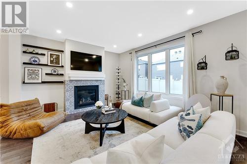 772 Cappamore Drive, Ottawa, ON - Indoor Photo Showing Living Room With Fireplace