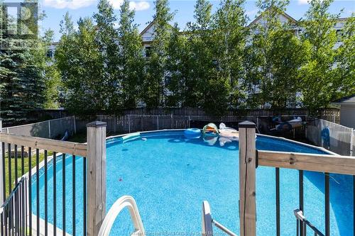 57 Hemmer Jane Dr, Moncton, NB - Outdoor With Above Ground Pool With Backyard