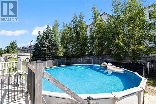57 Hemmer Jane Dr, Moncton, NB - Outdoor With Above Ground Pool With Backyard