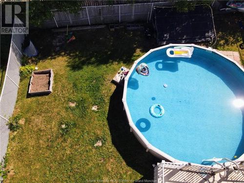 57 Hemmer Jane Dr, Moncton, NB - Outdoor With Above Ground Pool With Backyard