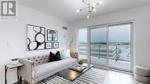 808 - 2150 Lawrence Avenue E, Toronto, ON - Indoor Photo Showing Living Room