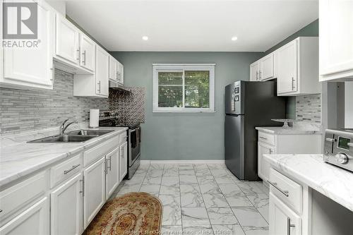 6700 Rose-Ville Garden Drive, Windsor, ON - Indoor Photo Showing Kitchen With Double Sink