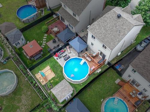 Vue d'ensemble - 273 Crois. Castelnaud, Mascouche, QC - Outdoor With Above Ground Pool With View