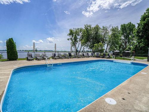 Piscine - 407-10 Rue Des Émeraudes, Repentigny (Repentigny), QC - Outdoor With In Ground Pool With Backyard