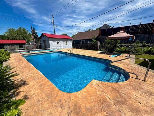 1006 Park Street, Kenora, ON - Outdoor With In Ground Pool With Backyard