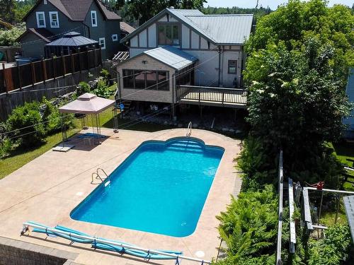 1006 Park Street, Kenora, ON - Outdoor With In Ground Pool With Deck Patio Veranda