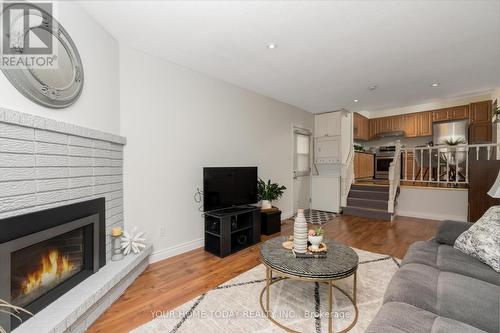 2667 Quill Crescent, Mississauga, ON - Indoor Photo Showing Living Room With Fireplace
