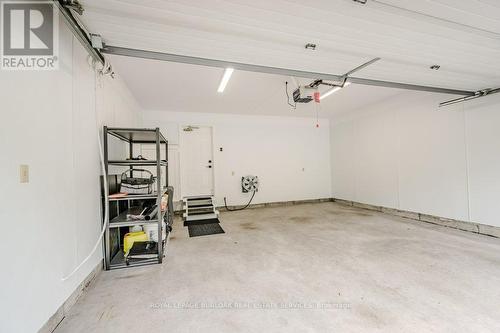 6 - 3333 New Street, Burlington (Roseland), ON - Indoor Photo Showing Garage