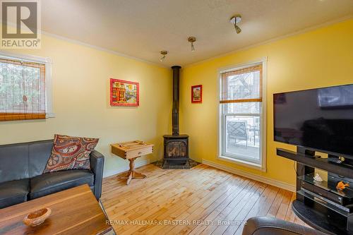 7066 Waverly Street, Hamilton Township (Bewdley), ON - Indoor Photo Showing Living Room With Fireplace