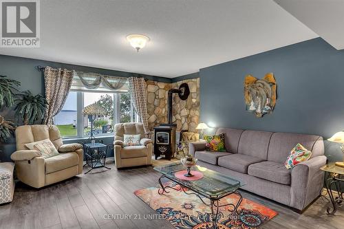 16 Helen Crescent, Kawartha Lakes, ON - Indoor Photo Showing Living Room With Fireplace