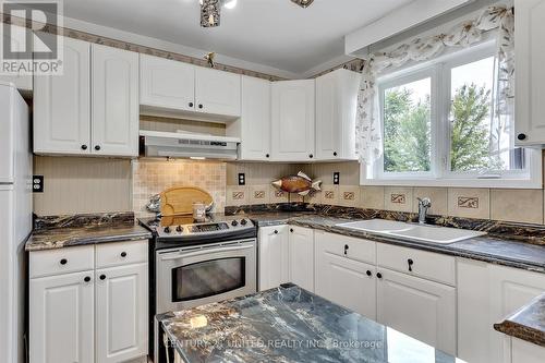 16 Helen Crescent, Kawartha Lakes, ON - Indoor Photo Showing Kitchen With Double Sink