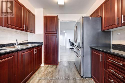 1509 - 400 Mclevin Avenue, Toronto, ON - Indoor Photo Showing Kitchen With Double Sink