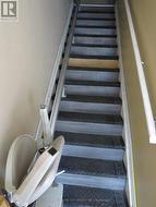 STAIRS TO SECOND FLOOR WITH CHAIR LIFT - 
