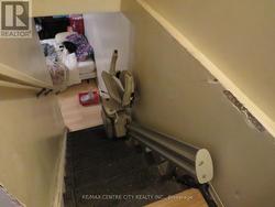 STAIRS TO BASEMENT FLOOR, CHAIR LIFT - 