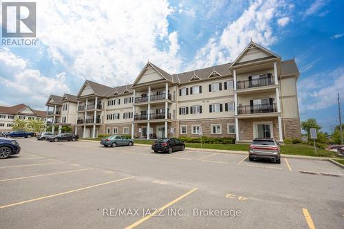202 - 1 Sidney Lane, Clarington, ON - Outdoor With Balcony With Facade