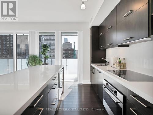 1002 - 65 St Mary Street, Toronto, ON - Indoor Photo Showing Kitchen With Upgraded Kitchen