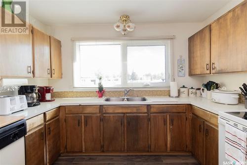 3003A 33Rd Street W, Saskatoon, SK - Indoor Photo Showing Kitchen With Double Sink