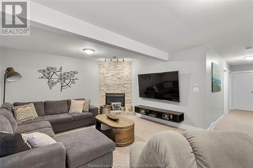 555 Sacred Heart, Lasalle, ON - Indoor Photo Showing Living Room With Fireplace