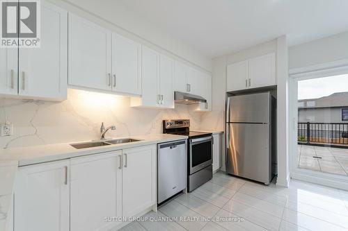 201 - 255 Woolwich Street, Woolwich, ON - Indoor Photo Showing Kitchen With Double Sink