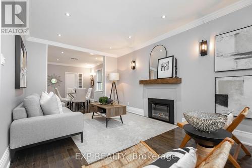 73 Hanna Road, Toronto, ON - Indoor Photo Showing Living Room With Fireplace