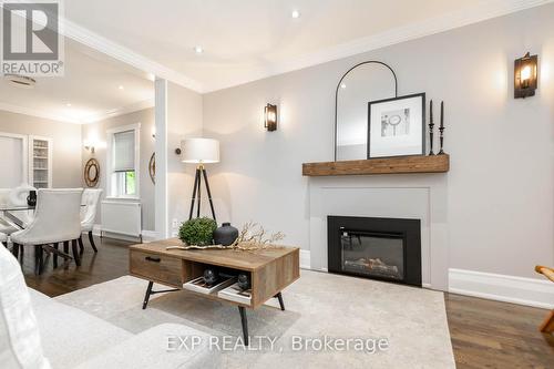 73 Hanna Road, Toronto, ON - Indoor Photo Showing Living Room With Fireplace