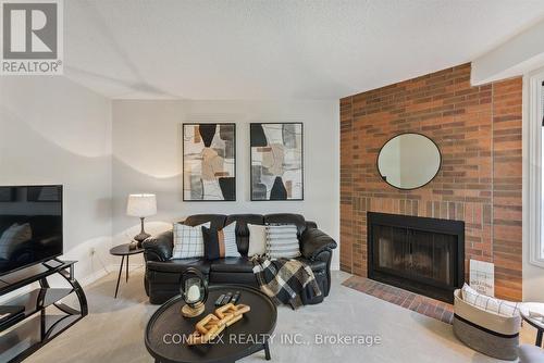 327 Challenger Court, Clarington, ON - Indoor Photo Showing Living Room With Fireplace