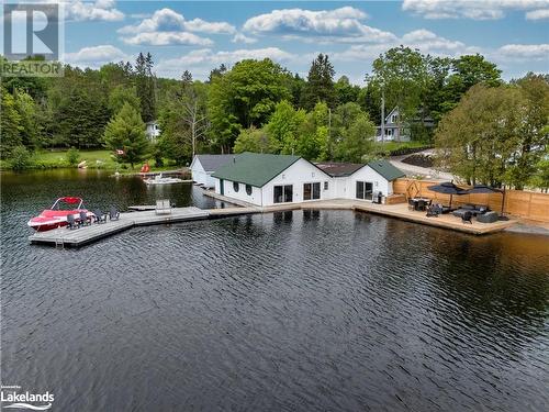 Dry boathouse with entertaining space - 1021 Marina Road, Huntsville, ON - Outdoor With Body Of Water With View