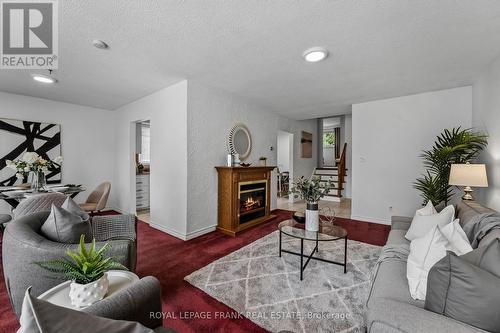20 Deerpark Crescent, Clarington, ON - Indoor Photo Showing Living Room With Fireplace