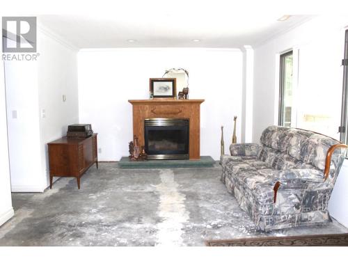 1311 Ida Road, Cranbrook, BC - Indoor Photo Showing Living Room With Fireplace