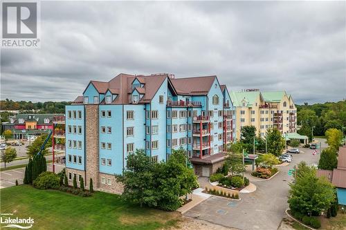 Exterior of The Greavette - 130 Steamship Bay Road Unit# 305, Gravenhurst, ON - Outdoor With Balcony With Facade