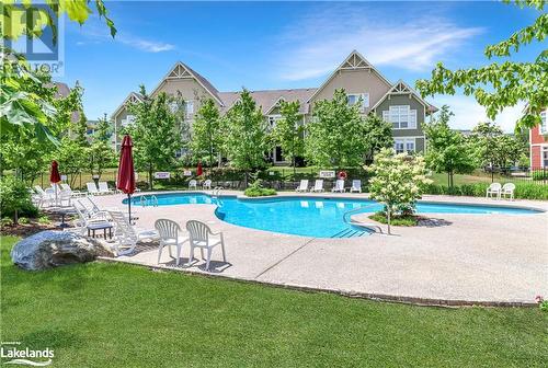 115 Fairway Court Unit# 211, The Blue Mountains, ON - Outdoor With In Ground Pool With Backyard